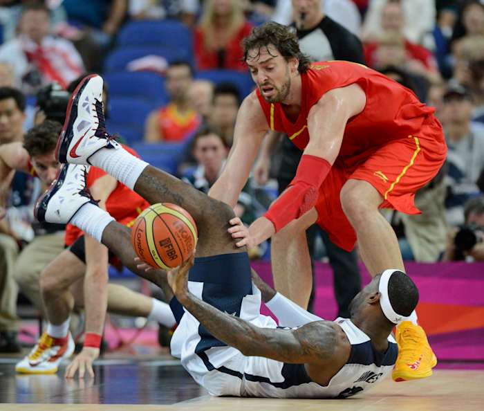 Team USA forward LeBron James falls on a loose ball in the 2012 Olympic Games.